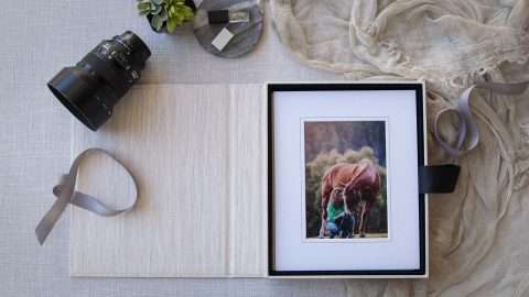 Holds up to 12 matted prints