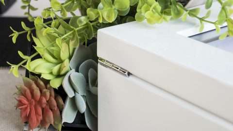 Featuring polished chrome latches and hinges